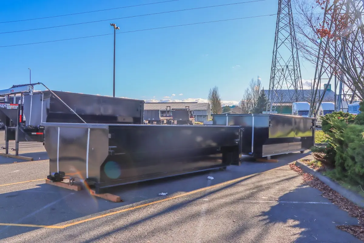 Roll-off dumpster ready for waste disposal at job site for 15 Yard Dumpster Rental in Renton